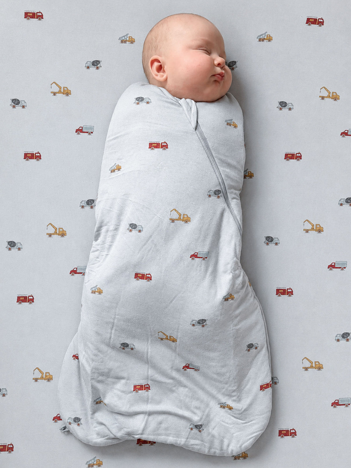 2.5 TOG swaddle sleep sack, light gray with multicolor vehicle print, wrapped foot