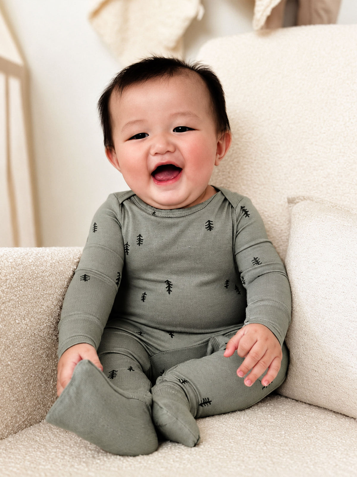 Convertible pajama in dark gray-green with tree print, long sleeve outfit with cuffs