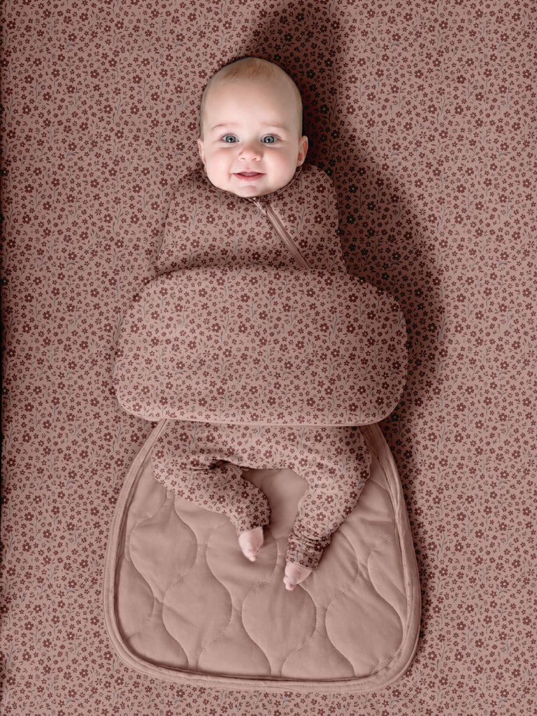 Pink floral infant sleep sack with long sleeves and padded bottom pouch