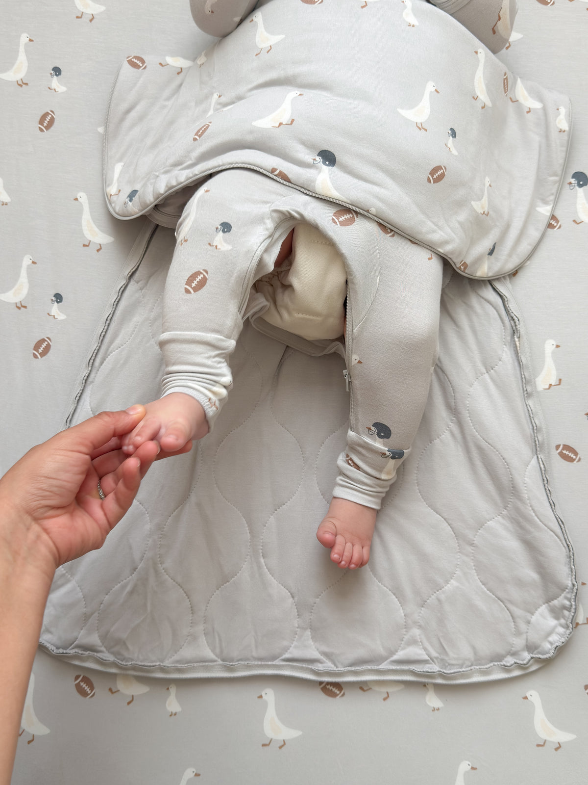 2.5 TOG sleep sack, light gray football goose print, open interior view