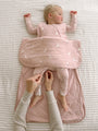 Pink 1.0 TOG sleep sack with goose print, open bottom with legs out