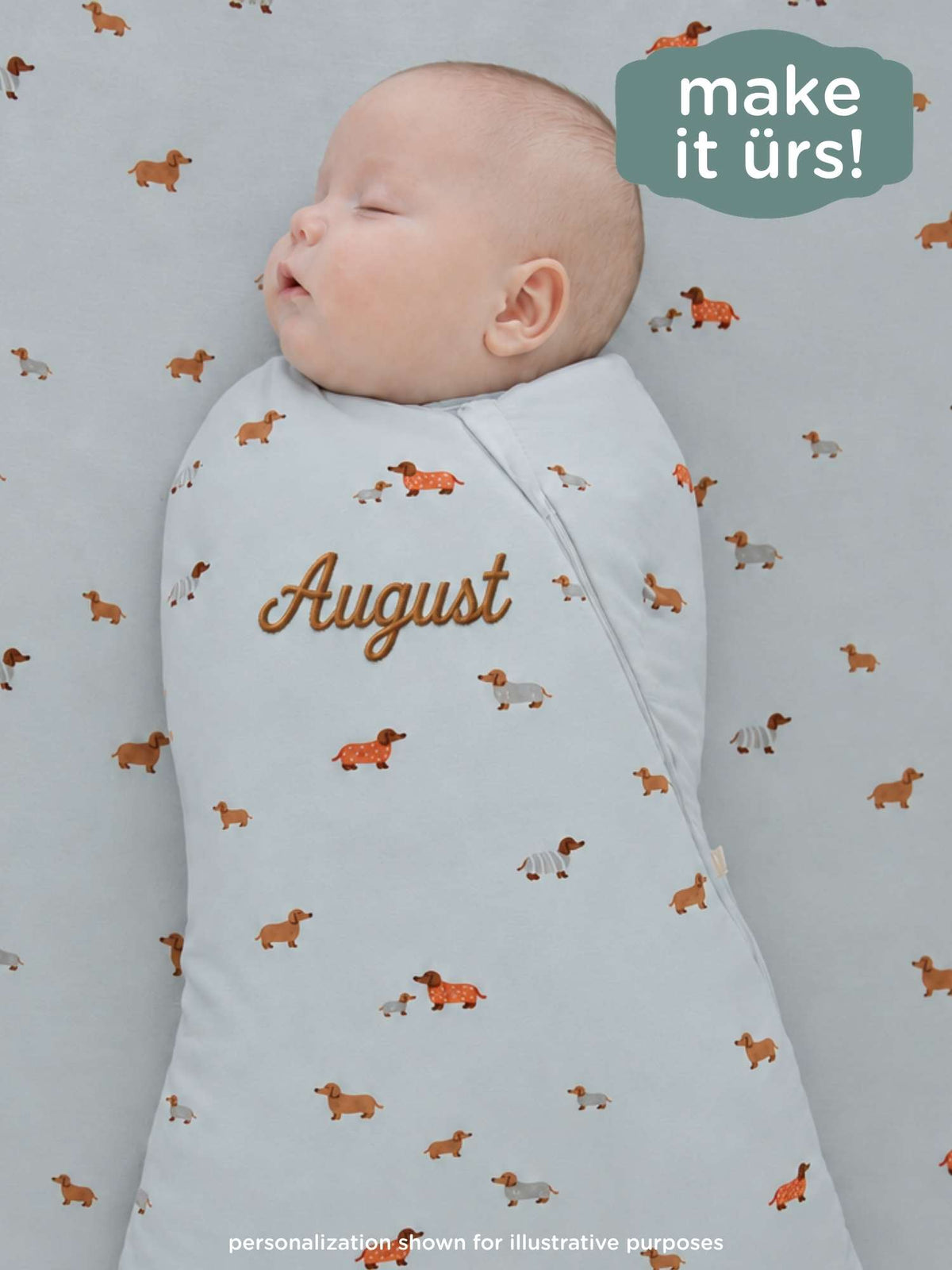 Light blue swaddle sleep sack with dachshund print and “August” embroidery, 1.0 TOG