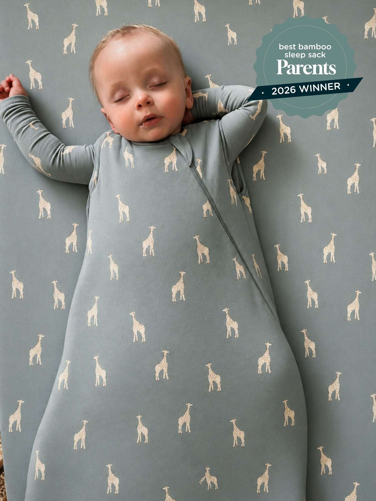 Baby sleep sack, dusty blue with repeating giraffe print, long sleeves