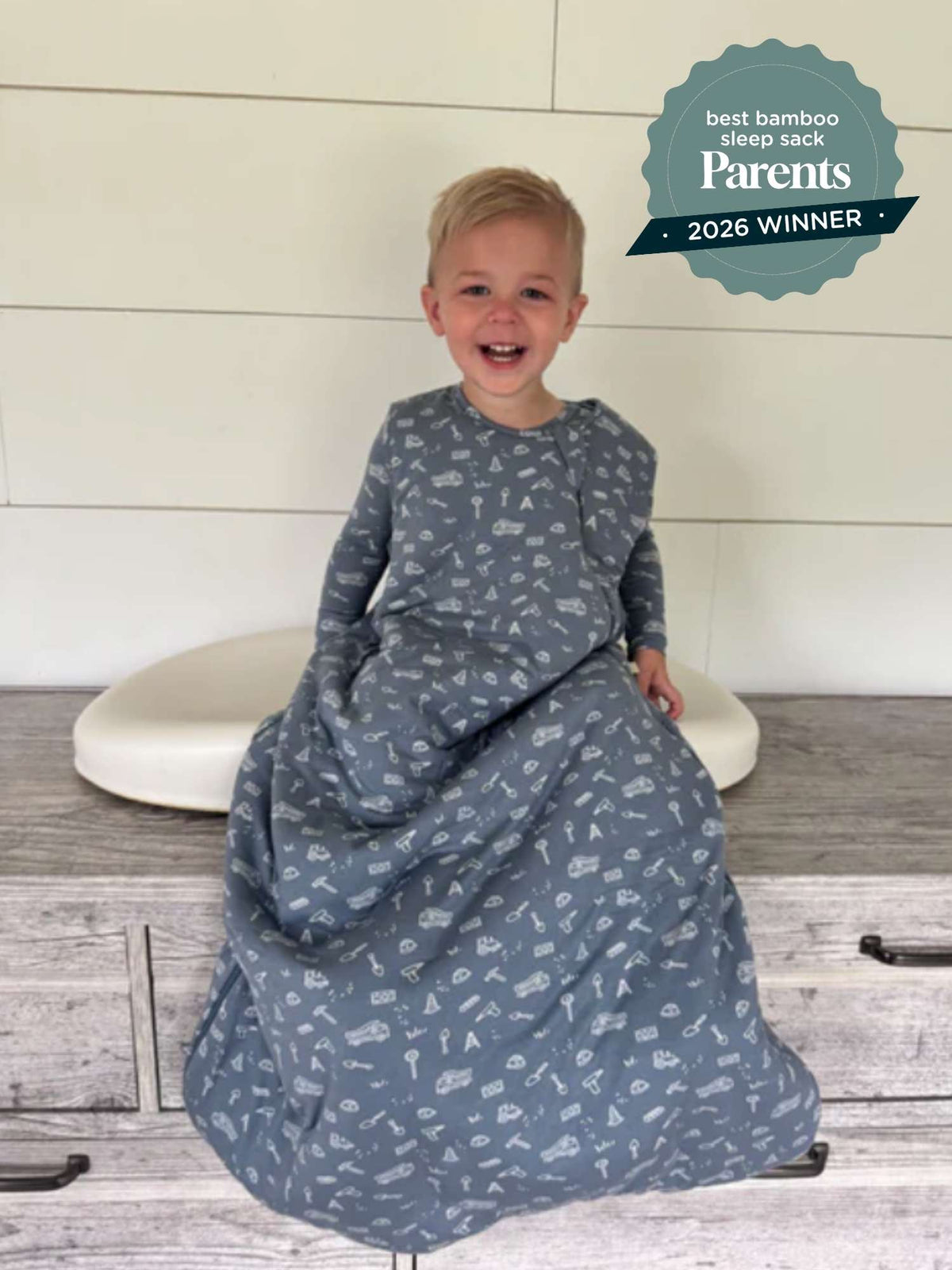 Blue construction print 1.0 TOG sleep sack with long sleeves and roomy wrap