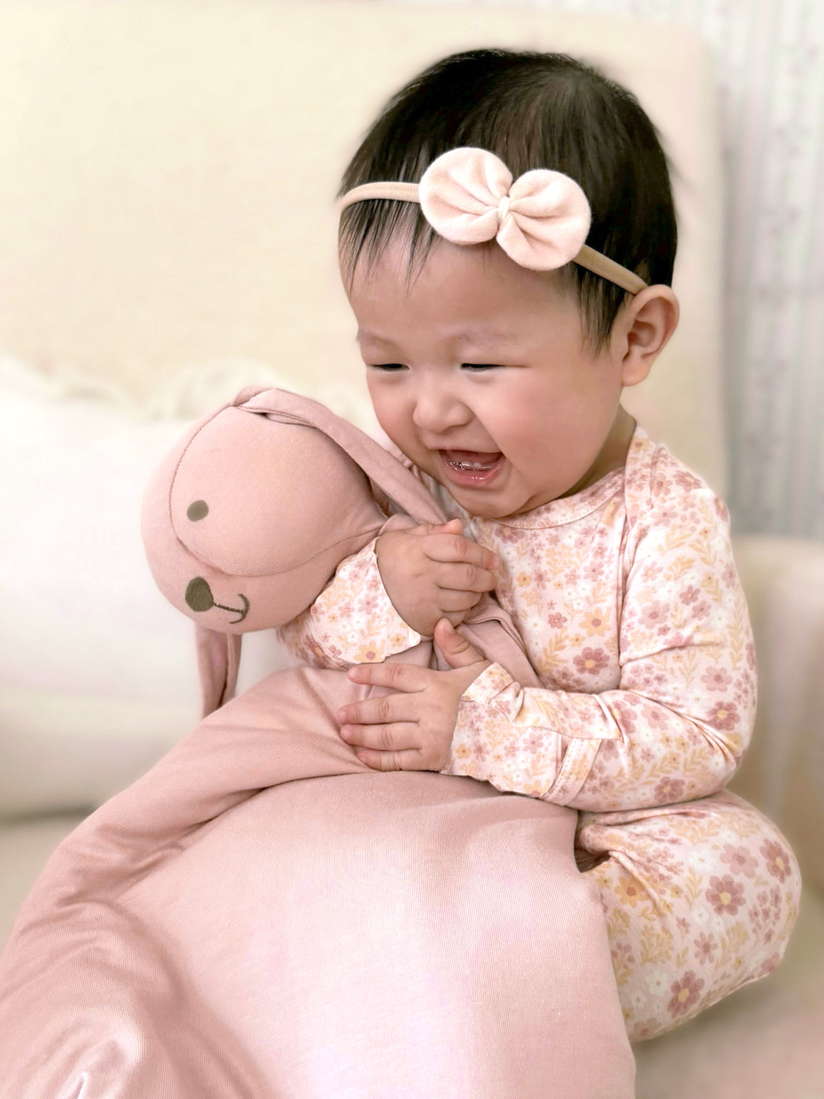 Floral long-sleeve pajama set with matching pants, sorbet pink tones; plush bear beside