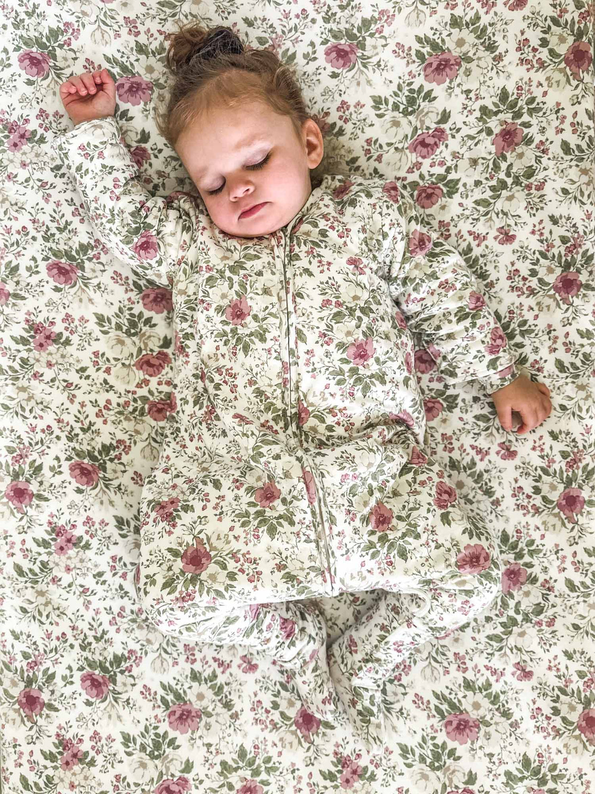 Floral long-sleeve footie sleep sack with front zipper, zip-up hood and all-over rose print