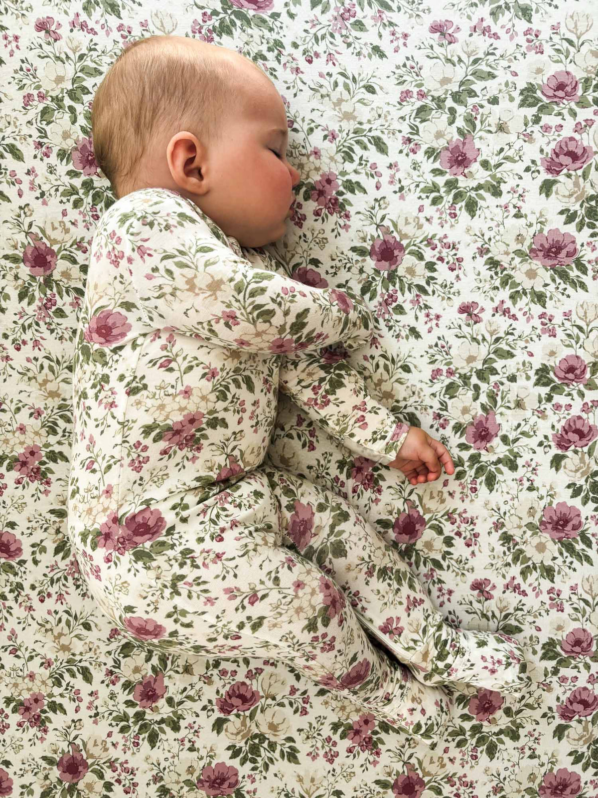 Floral convertible pajama for baby with long sleeves and footed legs