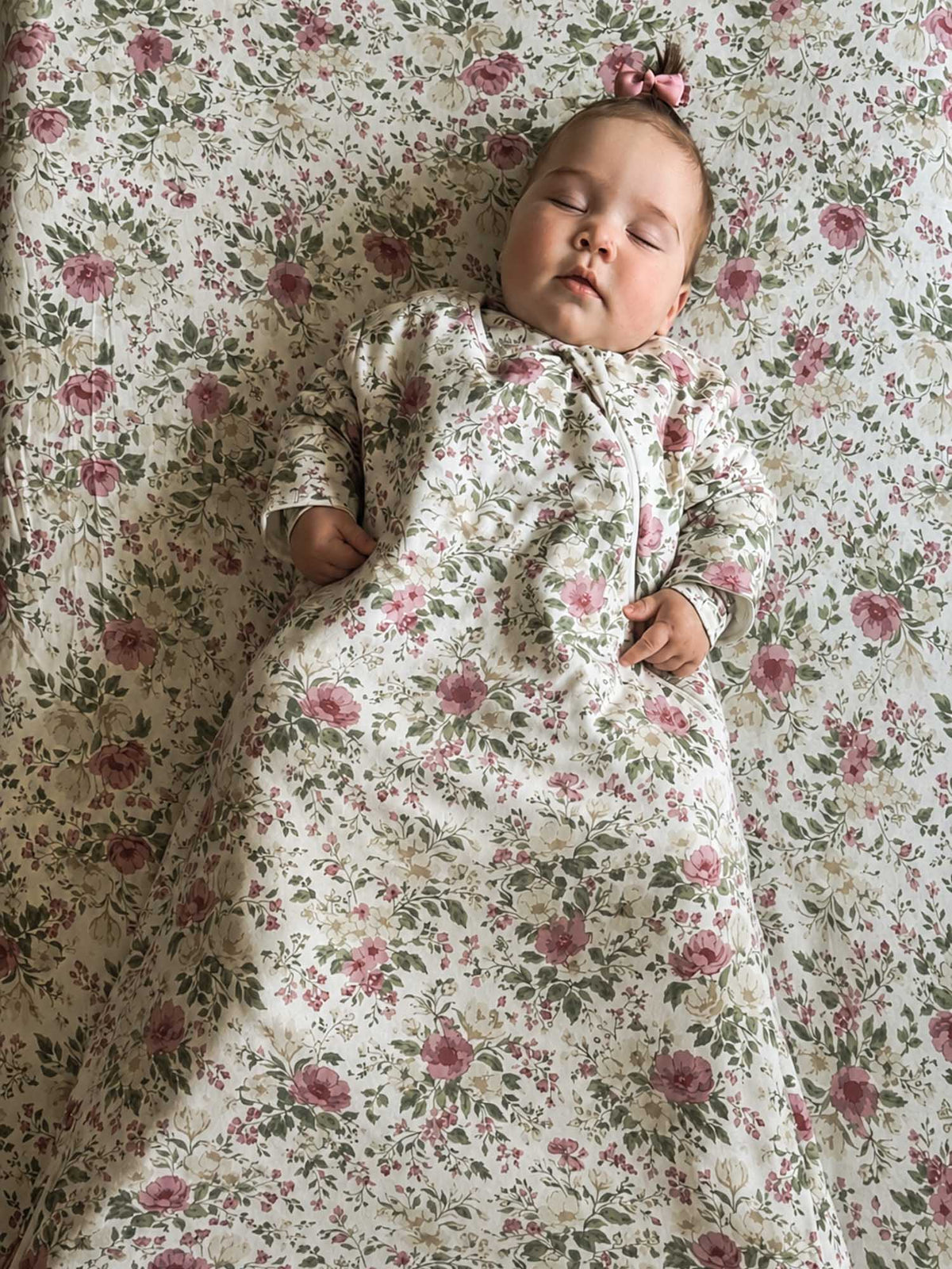 Long-sleeve floral sleep sack with pink rose print, front opening