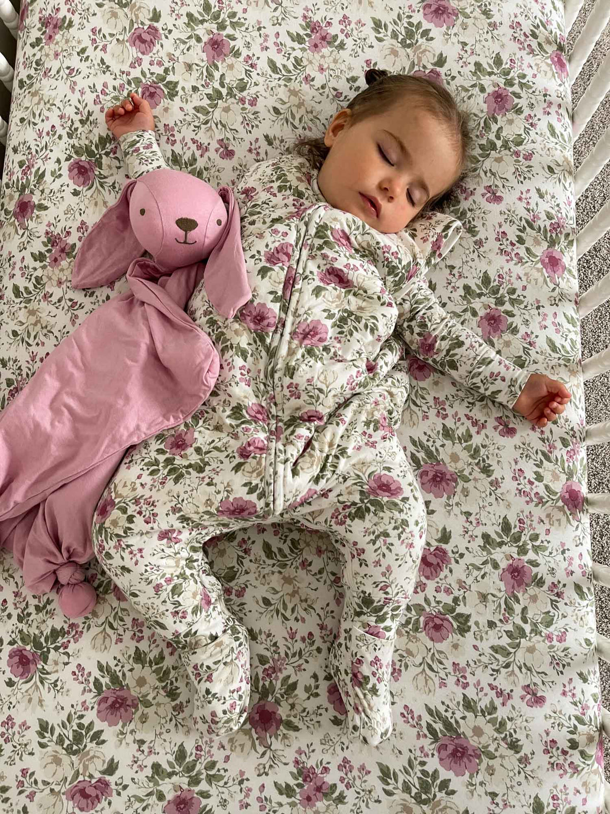 Floral footie sleep sack with bunny-shaped hood, zip front, long sleeves