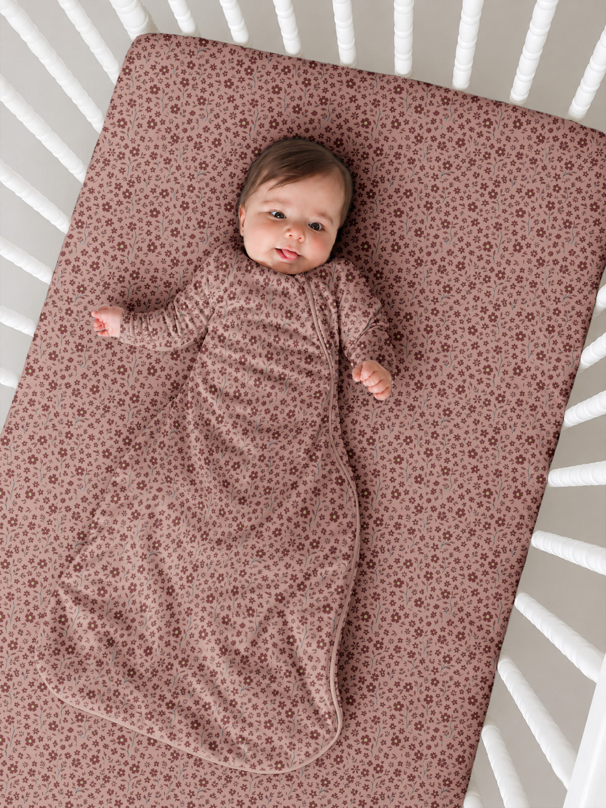 Long sleeve transitional swaddle sack in rose petal print with zipper front