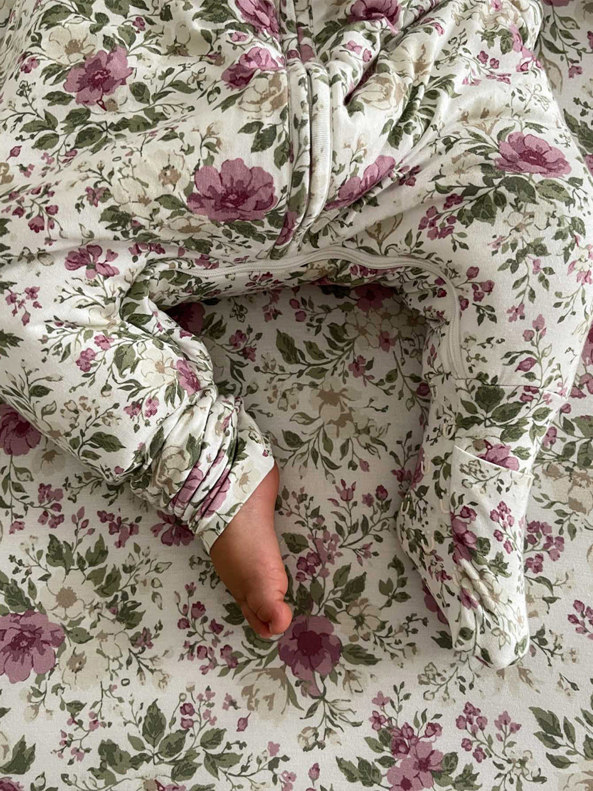 Cream floral footie sleep sack with zip front and covered feet, long sleeves