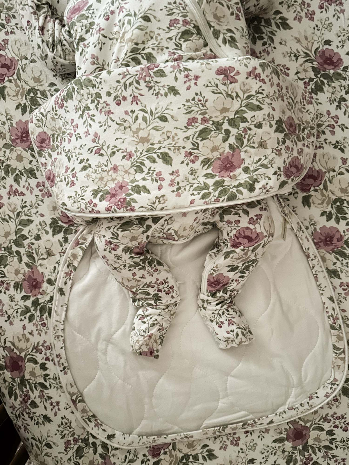 Floral swaddle sleep sack with front zipper and elastic leg gathers, sage and mauve